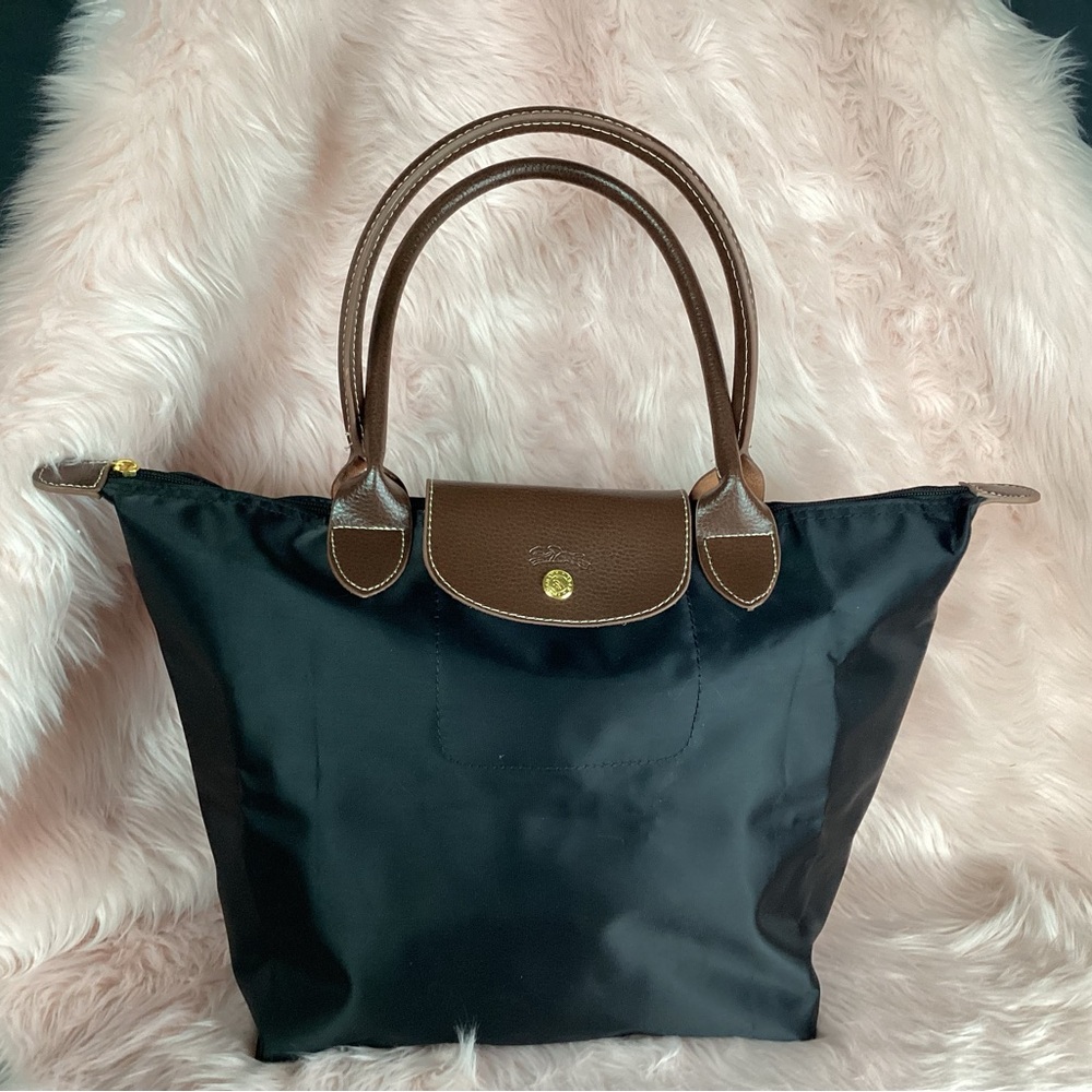 Longchamp large black nylon tote with leather straps and trim with gold hardware